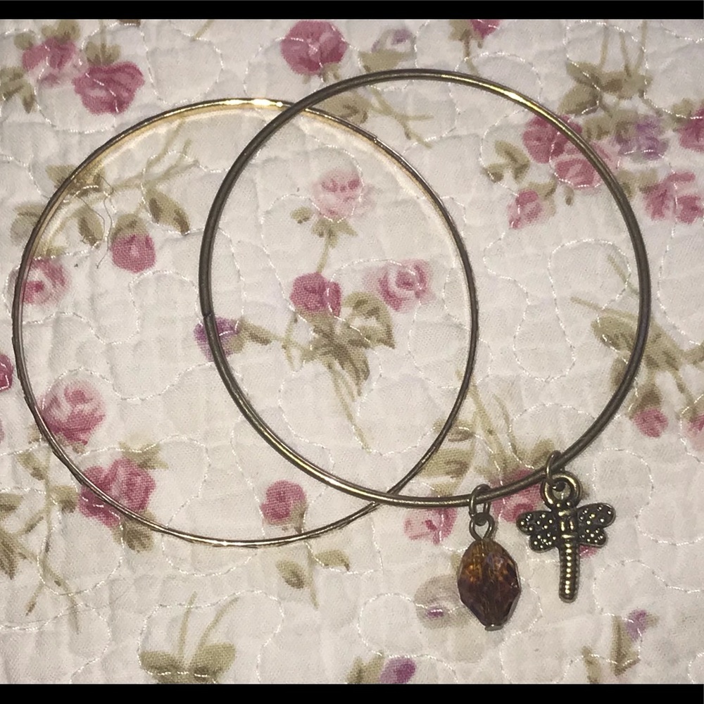 2 bracelets with firefly and orange charm